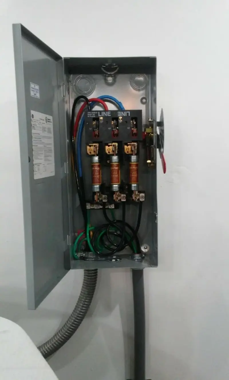 Three-phase disconnect switch installed for Smoke Detector Installation in Pierson